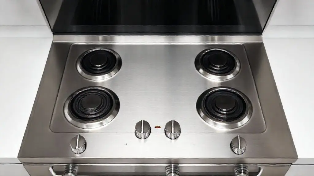 Fotografia de estúdio de um fogão moderno de quatro bocas em inox, destacando design, durabilidade e funcionalidade na cozinha.