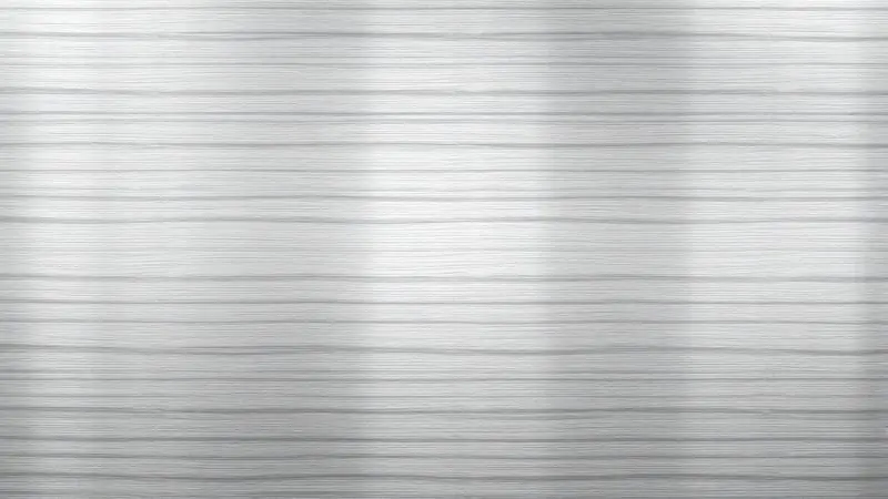 Ilustração mostrando direção das fibras do aço inox com setas indicando sentido correto da limpeza